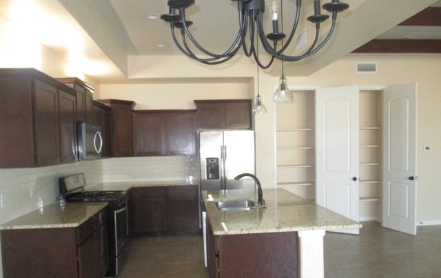 SANTA TERESA- 4 BR, 2 BA WITH REFRIGERATED AIR! property image